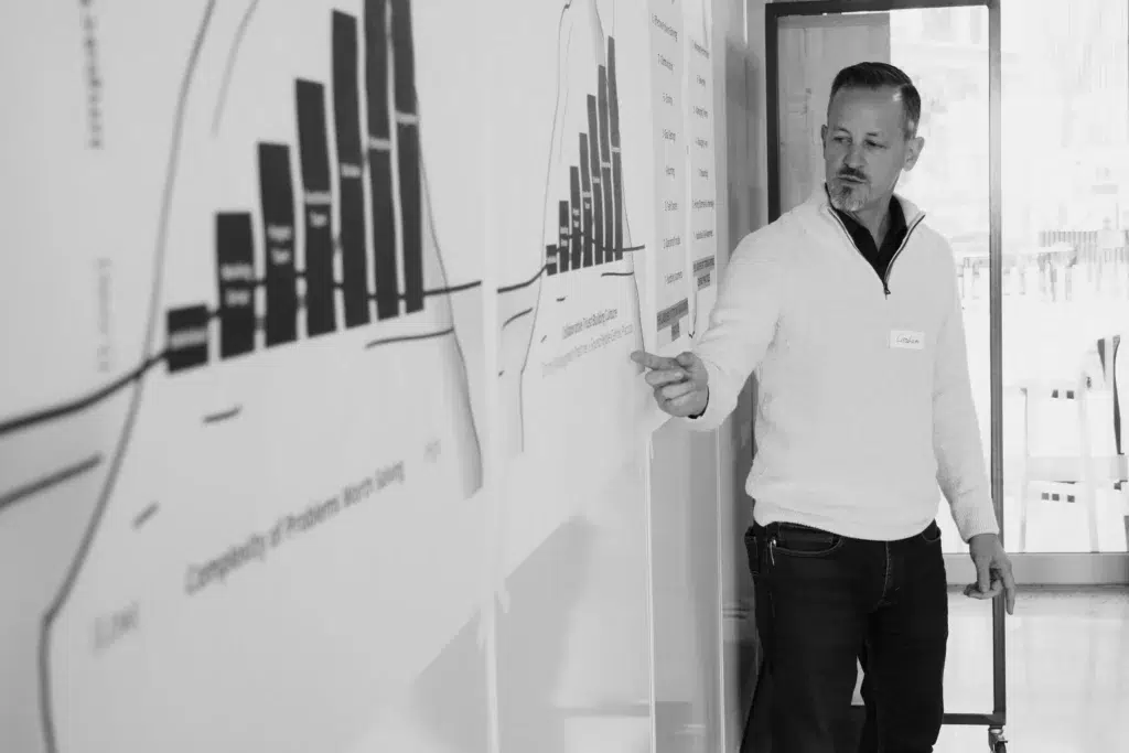 Corporate photography featuring a candid shot of a workshop presenter in action in Cape Town