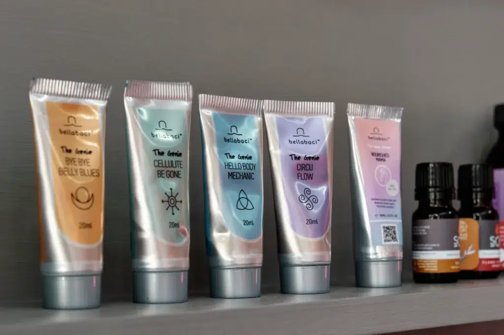 Corporate product photography highlighting Mommy Wellness's premium skincare and treatment products at their Claremont branch launch