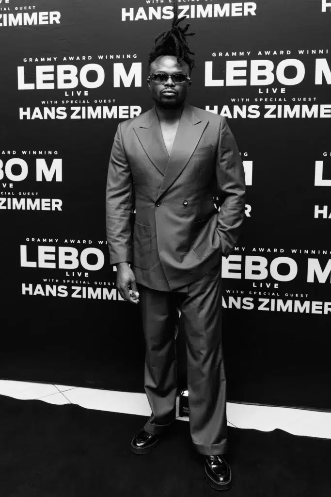 Musician Tresor smiling on the red carpet at the Lebo M and Hans Zimmer concert Cape Town.